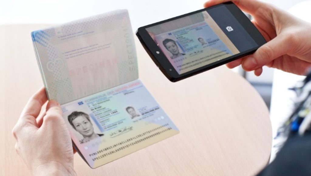 Passport being scanned by a smartphone